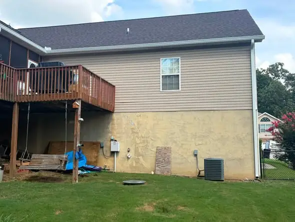 White downspout and seamless gutter on a Tennessee Valley home